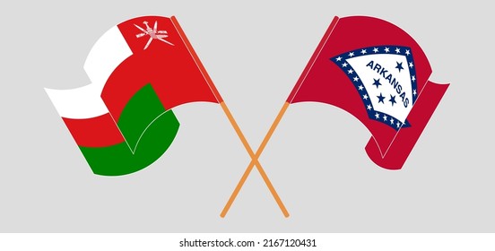 Crossed and waving flags of Oman and The State of Arkansas. Vector illustration
