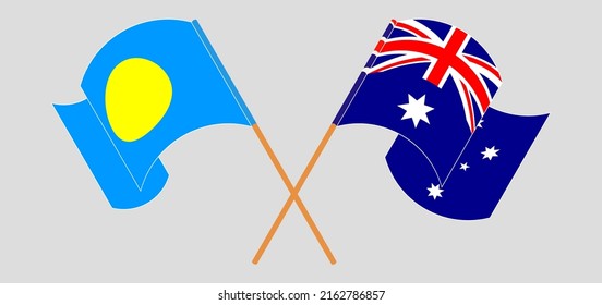 Crossed and waving flags of Palau and Australia. Vector illustration
