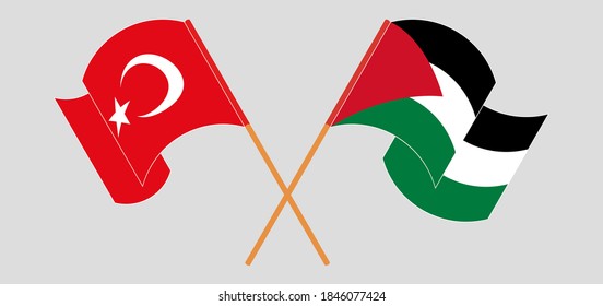 Crossed and waving flags of Palestine and Turkey
