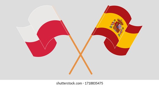 Crossed and waving flags of Poland and Spain