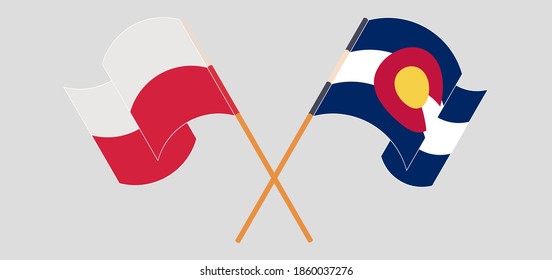 Crossed and waving flags of Poland and The State of Colorado