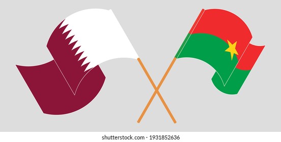 Crossed and waving flags of Qatar and Burkina Faso