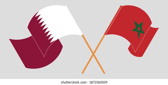 Cruzada y ondeando banderas de Qatar y Marruecos