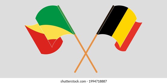 Crossed and waving flags of Republic of the Congo and Belgium
