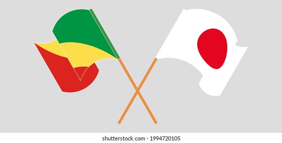 Crossed and waving flags of Republic of the Congo and Japan