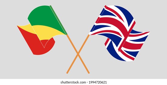 Banderas cruzadas y ondeando banderas de la República del Congo y del Reino Unido