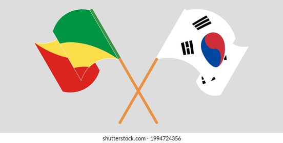 Banderas cruzadas y ondeando banderas de la República del Congo y Corea del Sur