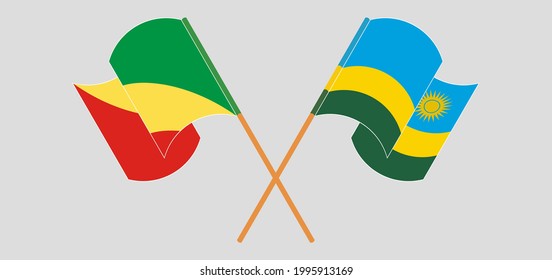 Crossed and waving flags of Republic of the Congo and Rwanda