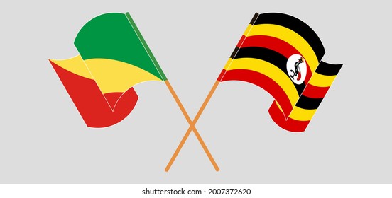 Banderas cruzadas y ondeando banderas de la República del Congo y Uganda