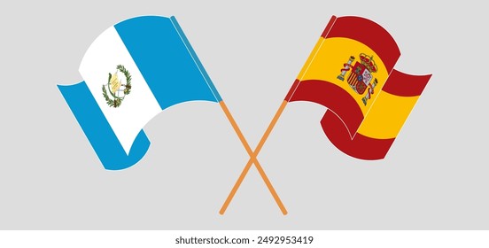 Crossed and waving flags of Republic of Guatemala and Spain. Vector illustration
