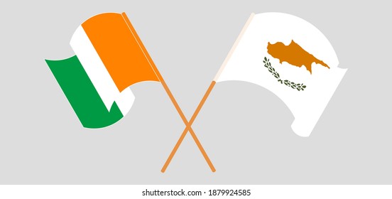 Crossed and waving flags of Republic of Ivory Coast and Cyprus