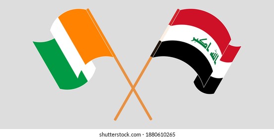 Crossed and waving flags of Republic of Ivory Coast and Iraq