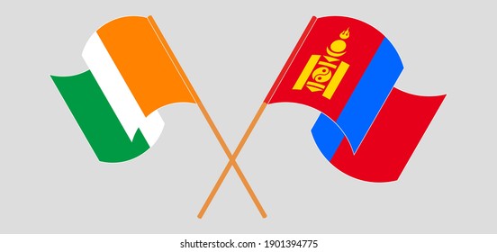 Gekreuzte und wehende Flaggen der Republik Côte d'Ivoire und der Mongolei