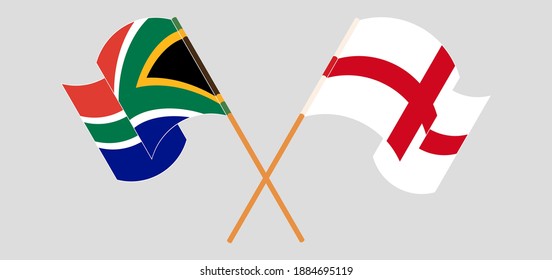 Crossed and waving flags of Republic of South Africa and England