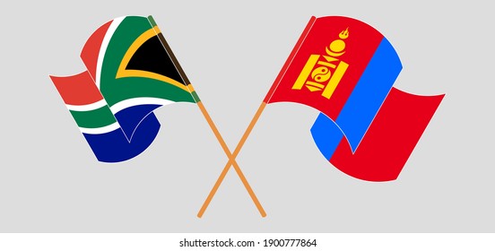 Banderas cruzadas y ondeadas de la República de Sudáfrica y Mongolia