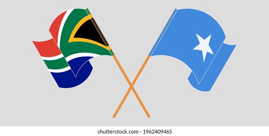 Crossed and waving flags of Republic of South Africa and Somalia
