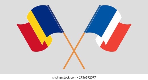 Crossed and waving flags of Romania and France