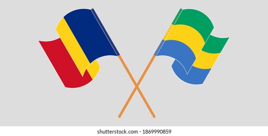 Crossed and waving flags of Romania and Gabon