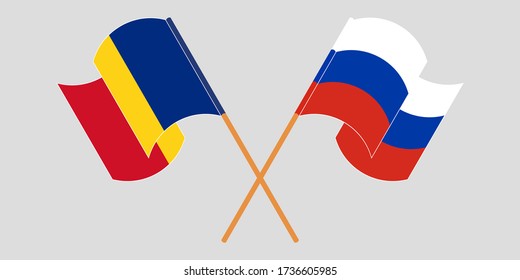 Crossed and waving flags of Romania and Russia