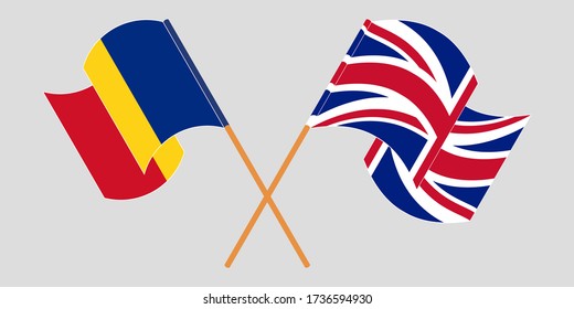 Crossed and waving flags of Romania and the UK