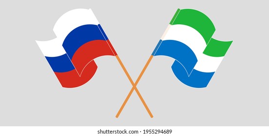 Crossed and waving flags of Russia and Sierra Leone