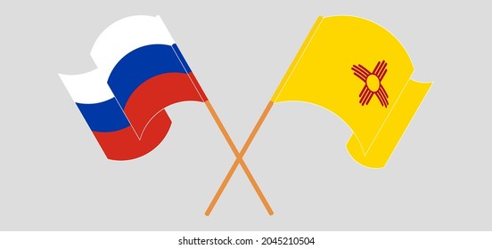 Crossed and waving flags of Russia and the State of New Mexico