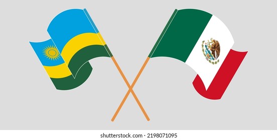 Crossed and waving flags of Rwanda and Mexico. Vector illustration
