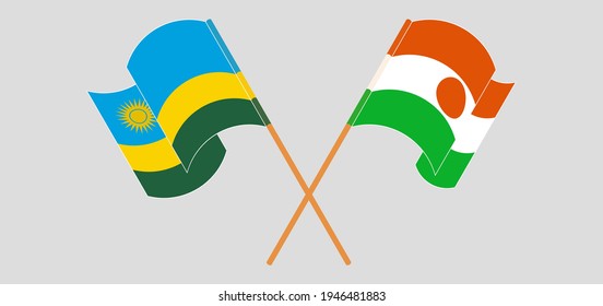 Crossed and waving flags of Rwanda and Niger