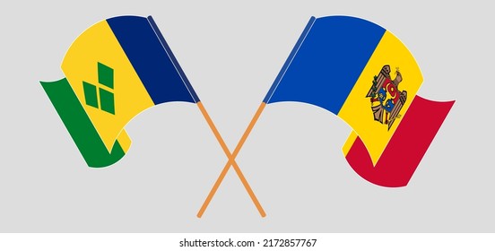 Crossed and waving flags of Saint Vincent and the Grenadines and Moldova. Vector illustration
