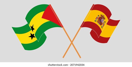 Crossed and waving flags of Sao Tome and Principe and Spain