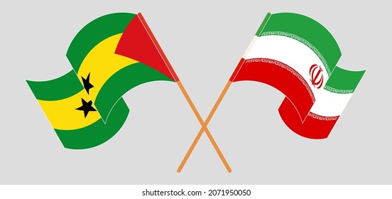 Crossed and waving flags of Sao Tome and Principe and Iran