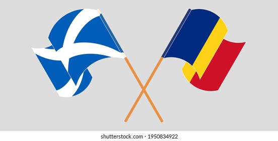 Crossed and waving flags of Scotland and Romania