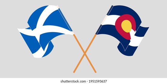Crossed and waving flags of Scotland and The State of Colorado