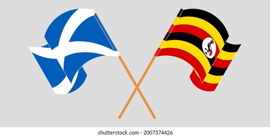 Crossed and waving flags of Scotland and Uganda