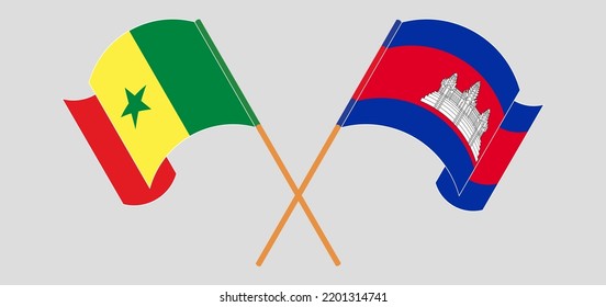 Crossed and waving flags of Senegal and Cambodia. Vector illustration
