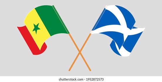 Crossed and waving flags of Senegal and Scotland