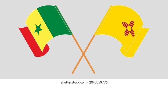 Crossed and waving flags of Senegal and the State of New Mexico
