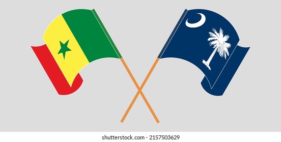 Crossed and waving flags of Senegal and The State of South Carolina. Vector illustration
