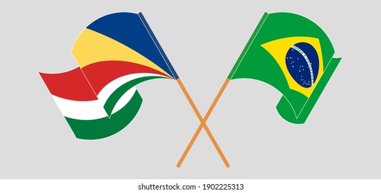 Crossed and waving flags of Seychelles and Brazil