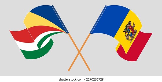 Crossed and waving flags of Seychelles and Moldova. Vector illustration
