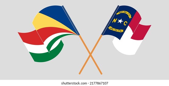 Crossed and waving flags of Seychelles and The State of North Carolina. Vector illustration
