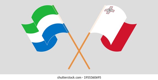 Crossed and waving flags of Sierra Leone and Malta