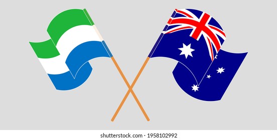 Crossed and waving flags of Sierra Leone and Australia