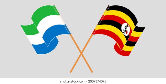 Crossed and waving flags of Sierra Leone and Uganda