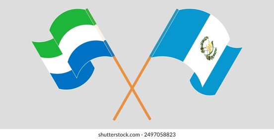 Gekreuzte und wehende Flaggen von Sierra Leone und der Republik Guatemala. Vektorgrafik
