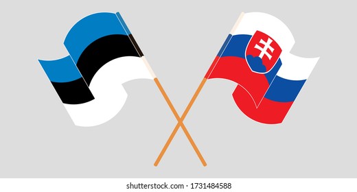 Crossed and waving flags of Slovakia and Estonia