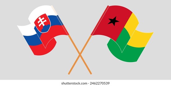 Crossed and waving flags of Slovakia and Guinea-Bissau. Vector illustration
