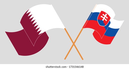 Crossed and waving flags of Slovakia and Qatar