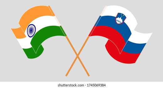 Crossed and waving flags of Slovenia and India