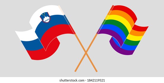 Crossed and waving flags of Slovenia and LGBTQ